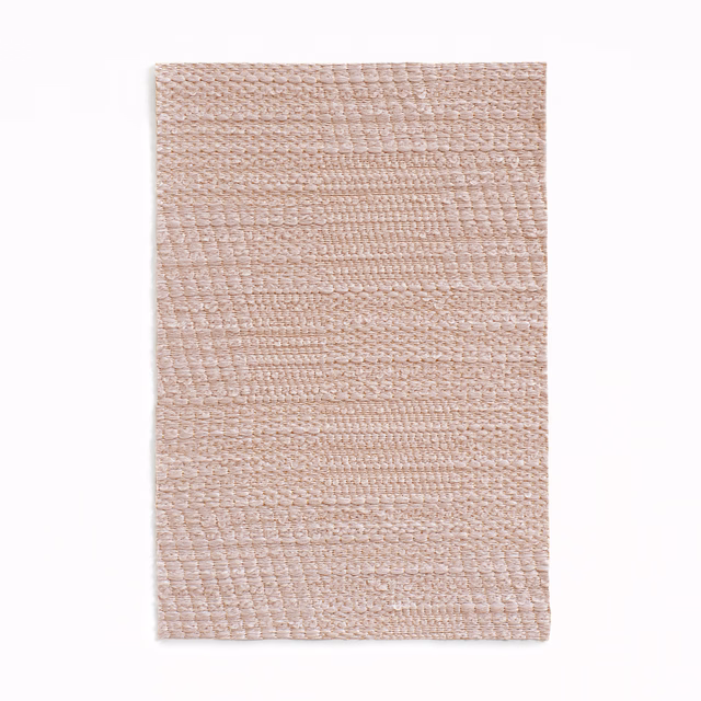 Pale blush rose jacquard swatch with irregular horizontal patchwork weave