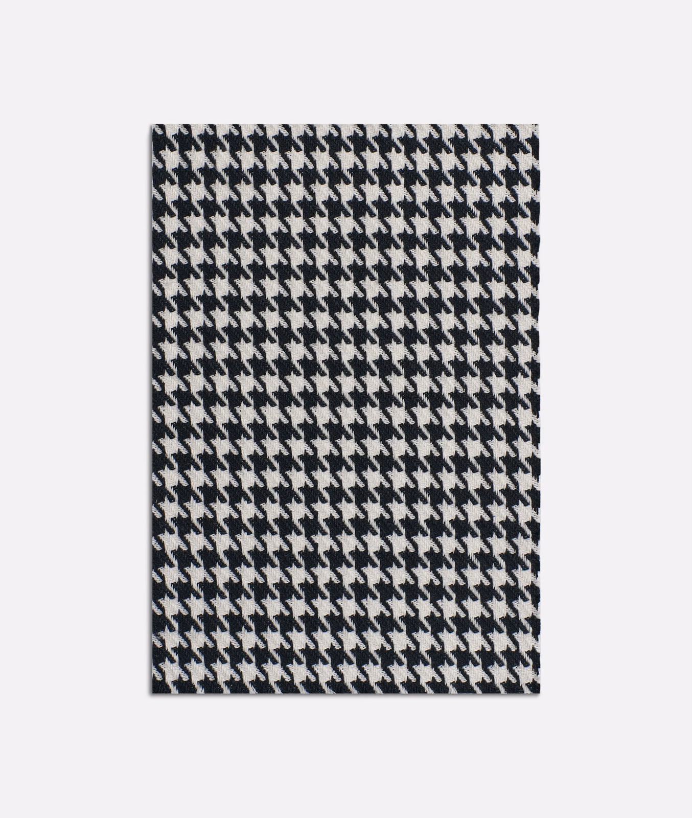 Black and ivory small-scale houndstooth jacquard with a dense textured weave