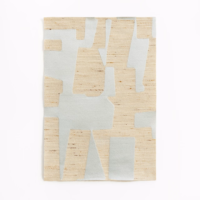 Pale glacier-blue and oat jacquard with large abstract blocks and slubbed texture