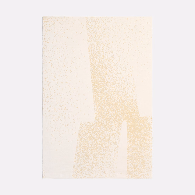 Warm ivory jacquard with a pale champagne pixel-like vertical motif and speckled texture