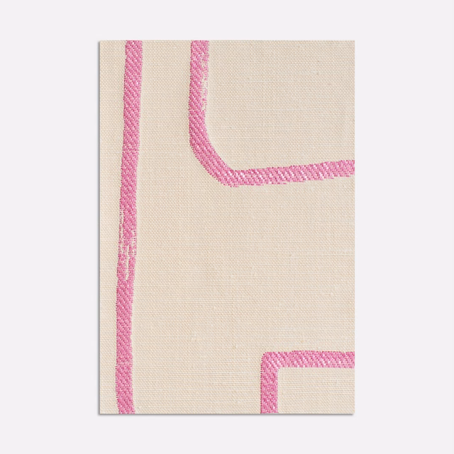Cream jacquard ground with blush-pink rounded linear bands in close-up