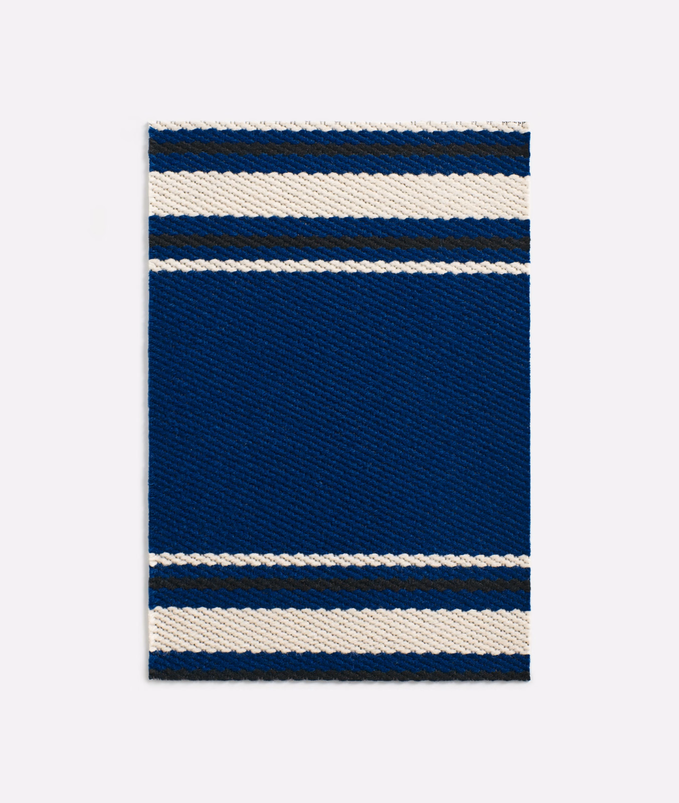 Deep navy woven fabric with cream horizontal bands and fine diagonal texture