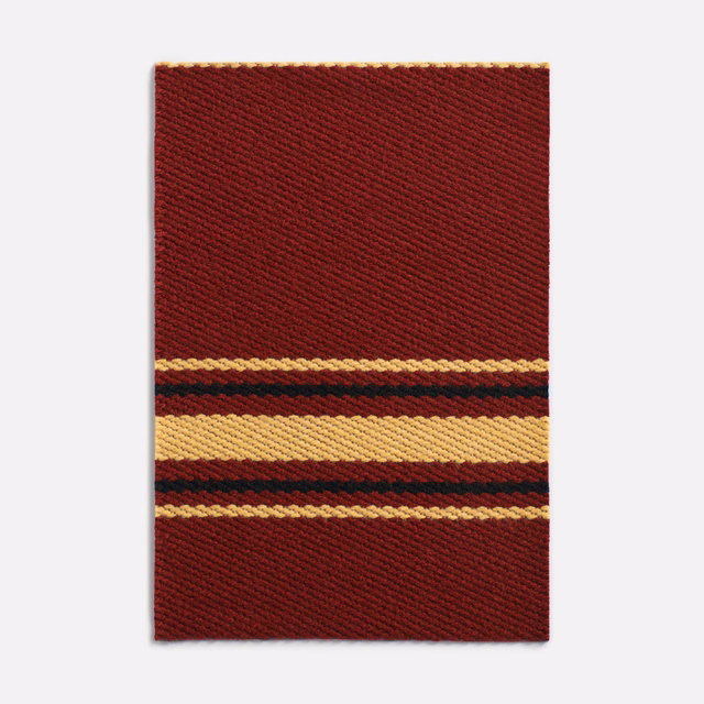 Deep bordeaux jacquard swatch with mustard, cream and dark horizontal bands
