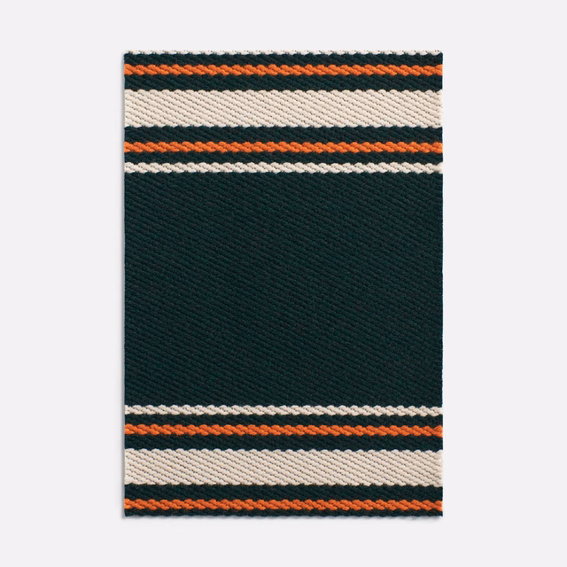 Deep petrol teal woven swatch with cream, rust and black horizontal bands