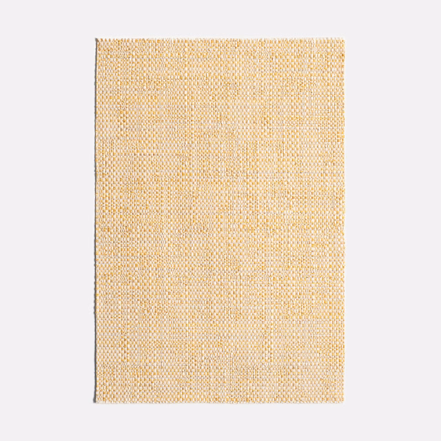 Pale mimosa-yellow jacquard swatch with a fine, softly flecked woven texture