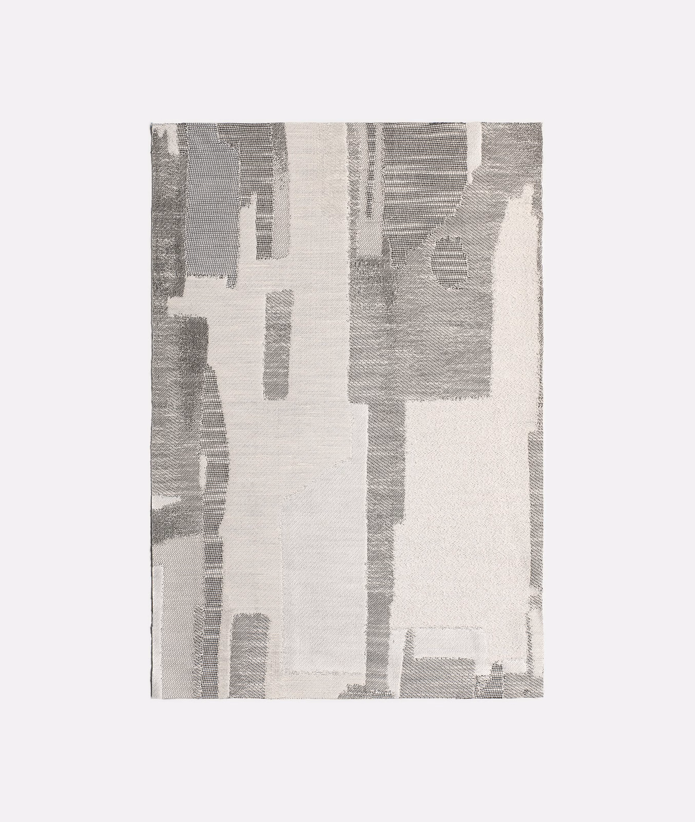 Cool grey and ivory jacquard with irregular architectural blocks and fine woven texture