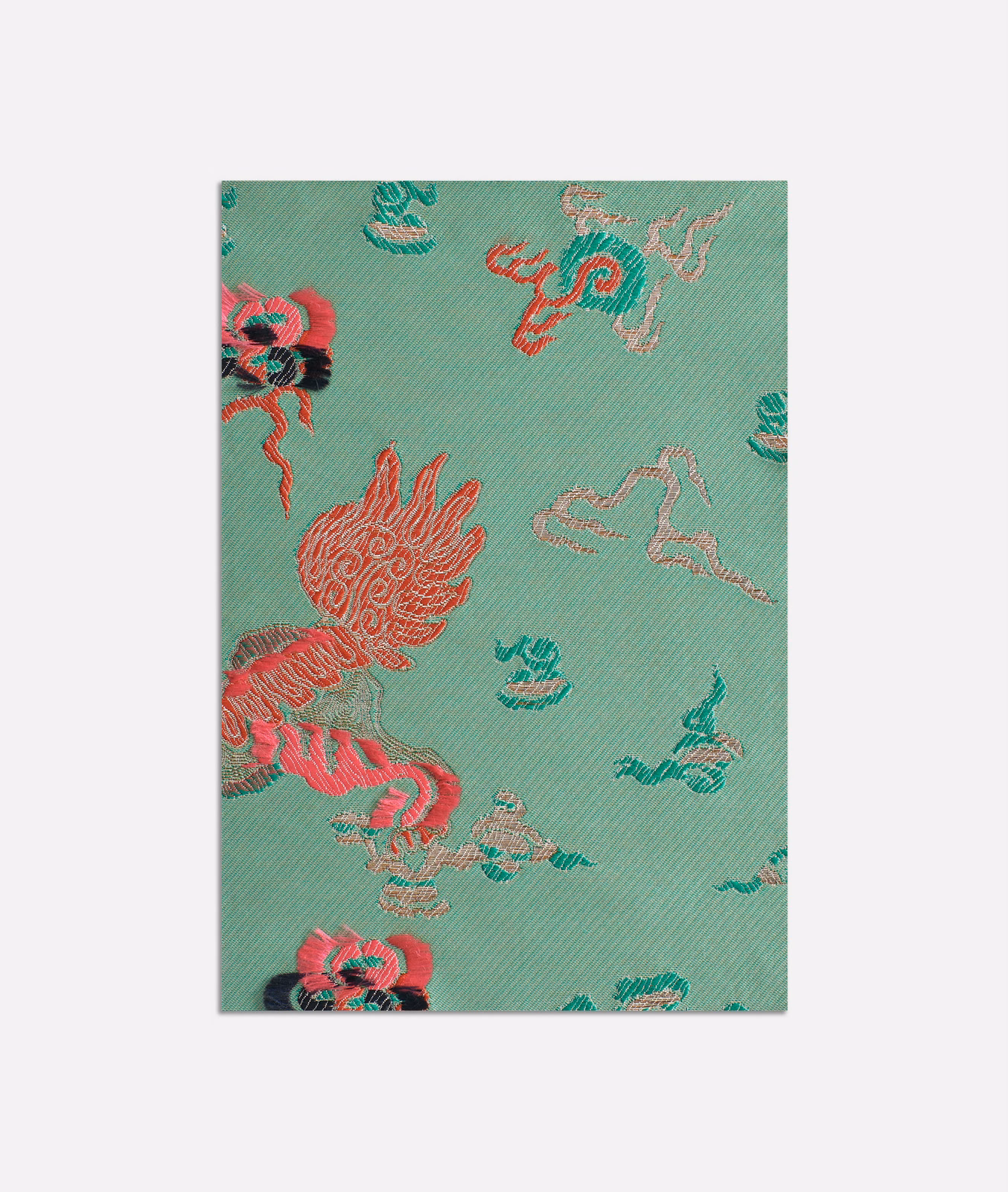 Mint-teal jacquard with coral dragon-like motifs and pink ornamental curls