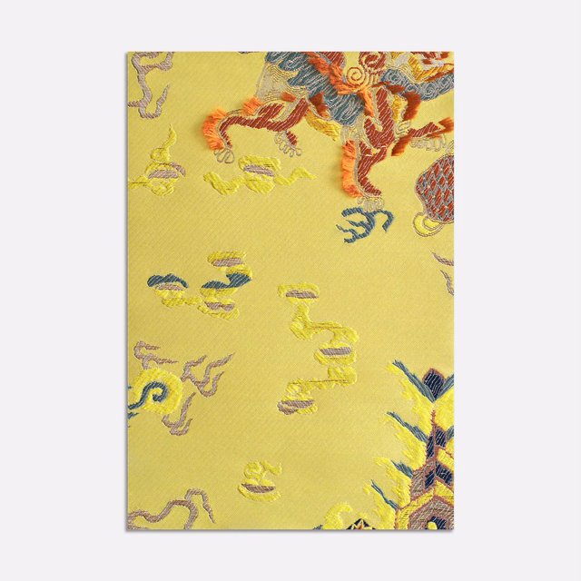 Chartreuse yellow jacquard with coral, blue, lavender and abstract textured motifs