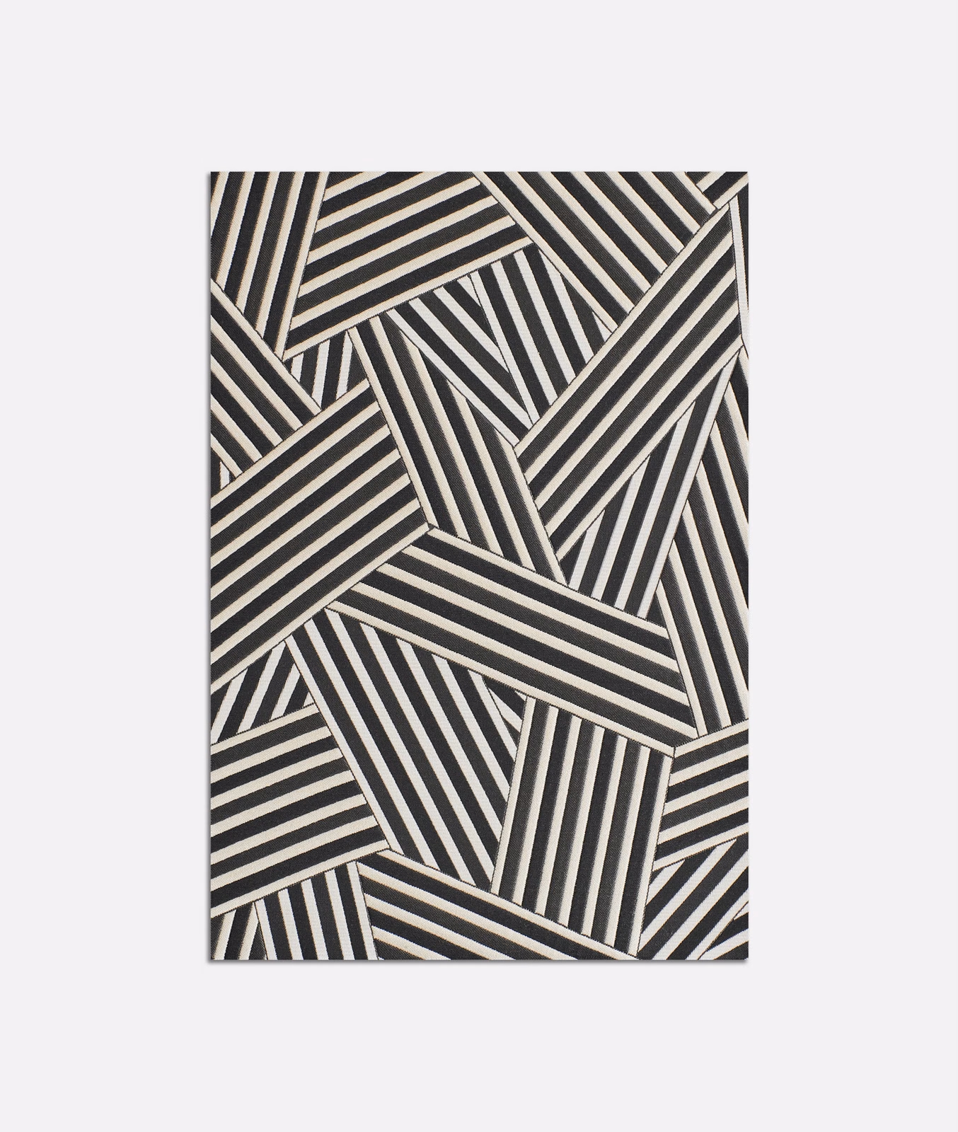 Black and ivory jacquard with interlocking angled stripe panels and woven texture