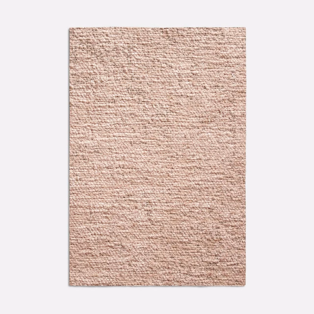 Dusty blush-pink jacquard swatch with a nubby, softly horizontal woven texture