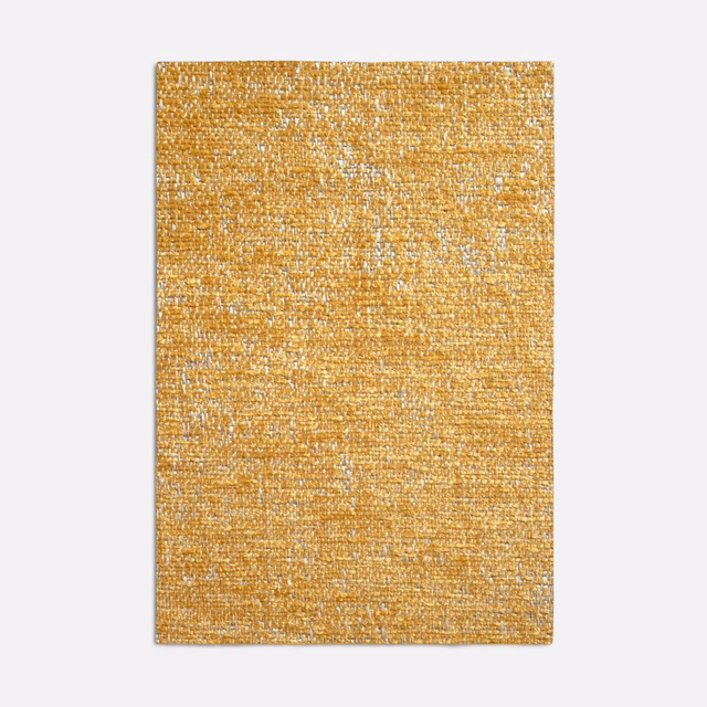 Warm saffron-gold jacquard swatch with dense flecked weave and subtle tonal texture