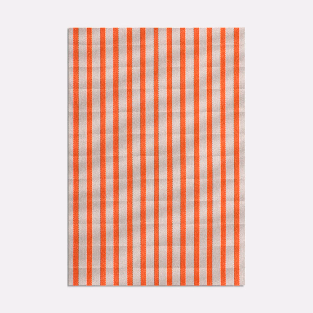 Carrot-orange and pale grey vertical stripes with a softly textured jacquard weave