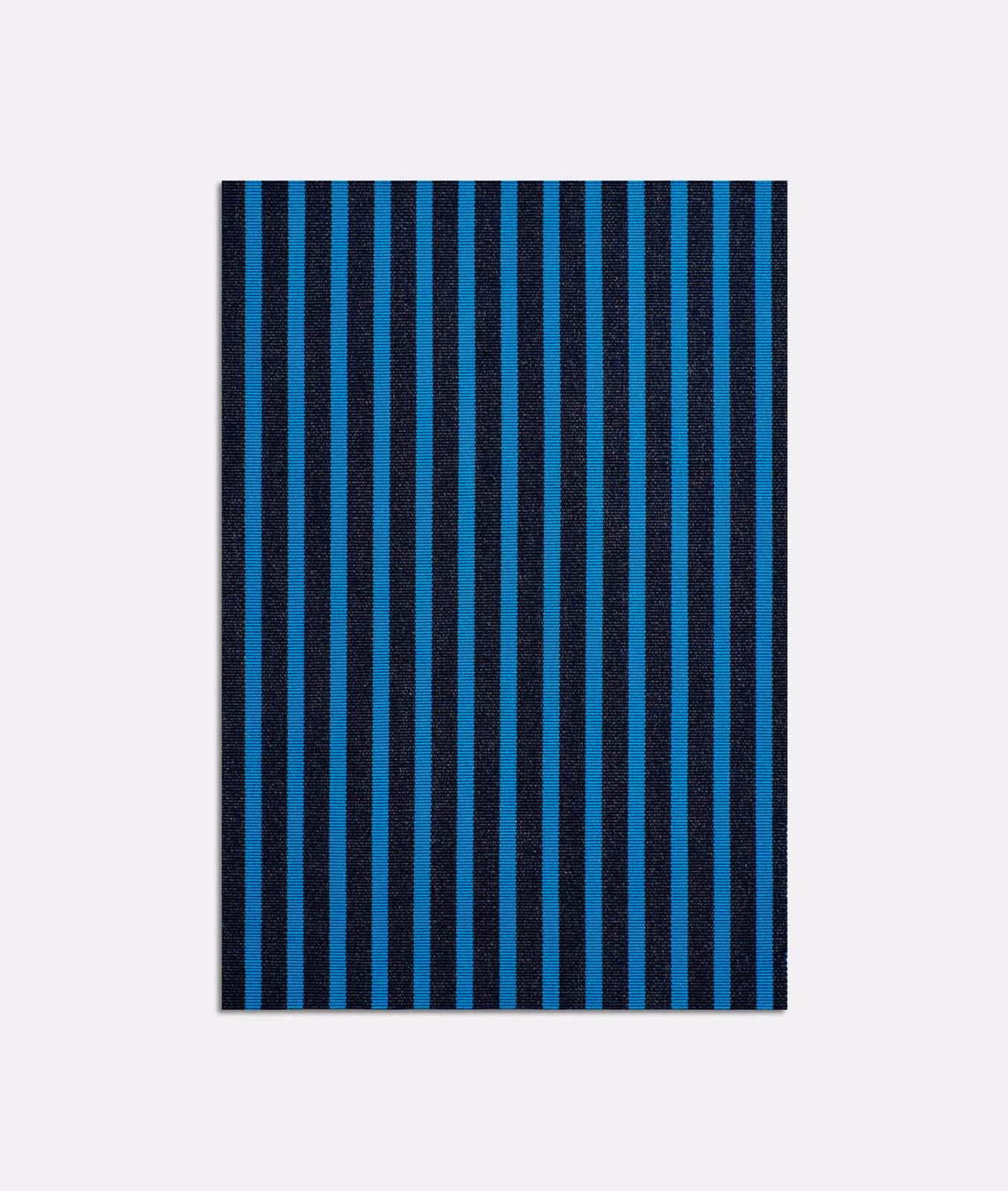 Cool teal and black vertical striped jacquard fabric with a dense woven surface