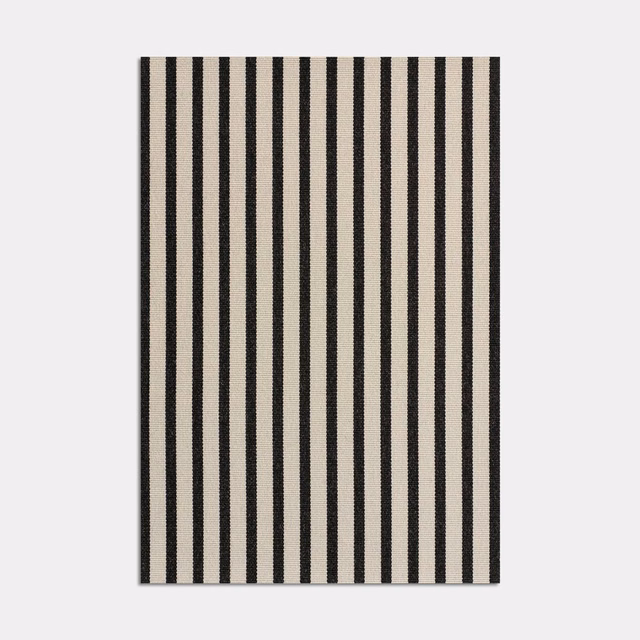 Black and warm ivory vertical stripes in a finely textured jacquard weave
