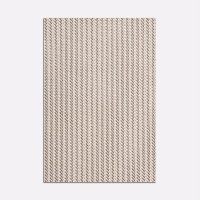 Warm pale beige jacquard swatch with a fine raised diagonal chevron weave