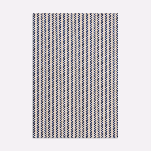 Deep navy jacquard with fine cream zigzag stripes in vertical rows