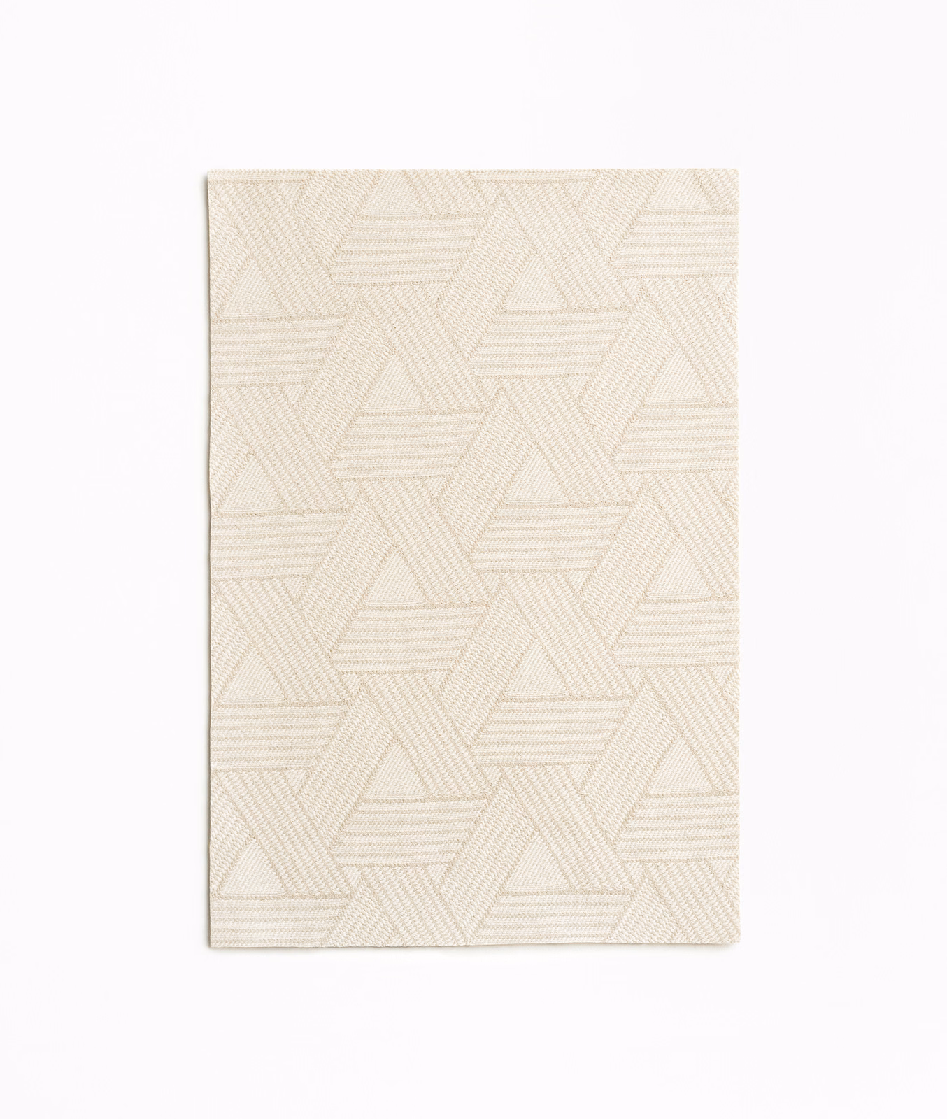 Ivory jacquard swatch with interlocking triangles and fine horizontal geometric lines