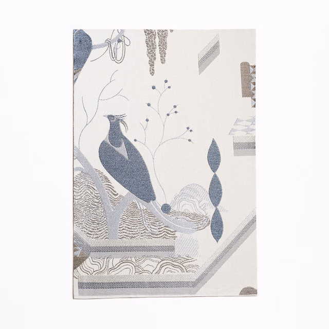 Ivory jacquard with blue-grey birds, leaves, waves and geometric bands