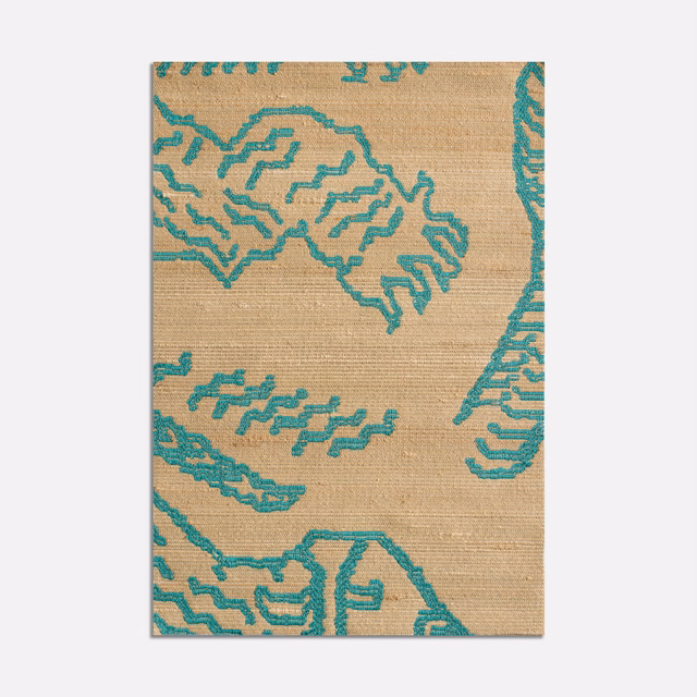 Muted turquoise tiger-like tracery over a warm tan ground, close-up woven swatch