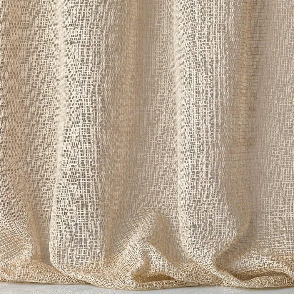 Warm ivory open-grid jacquard fabric draped in soft, fluid folds
