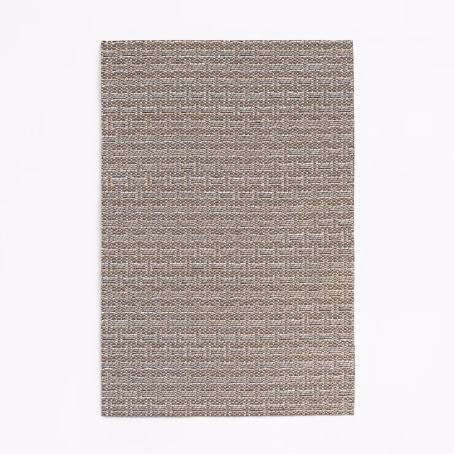 Cool taupe-grey jacquard swatch with dense horizontal ridges and mottled flecks