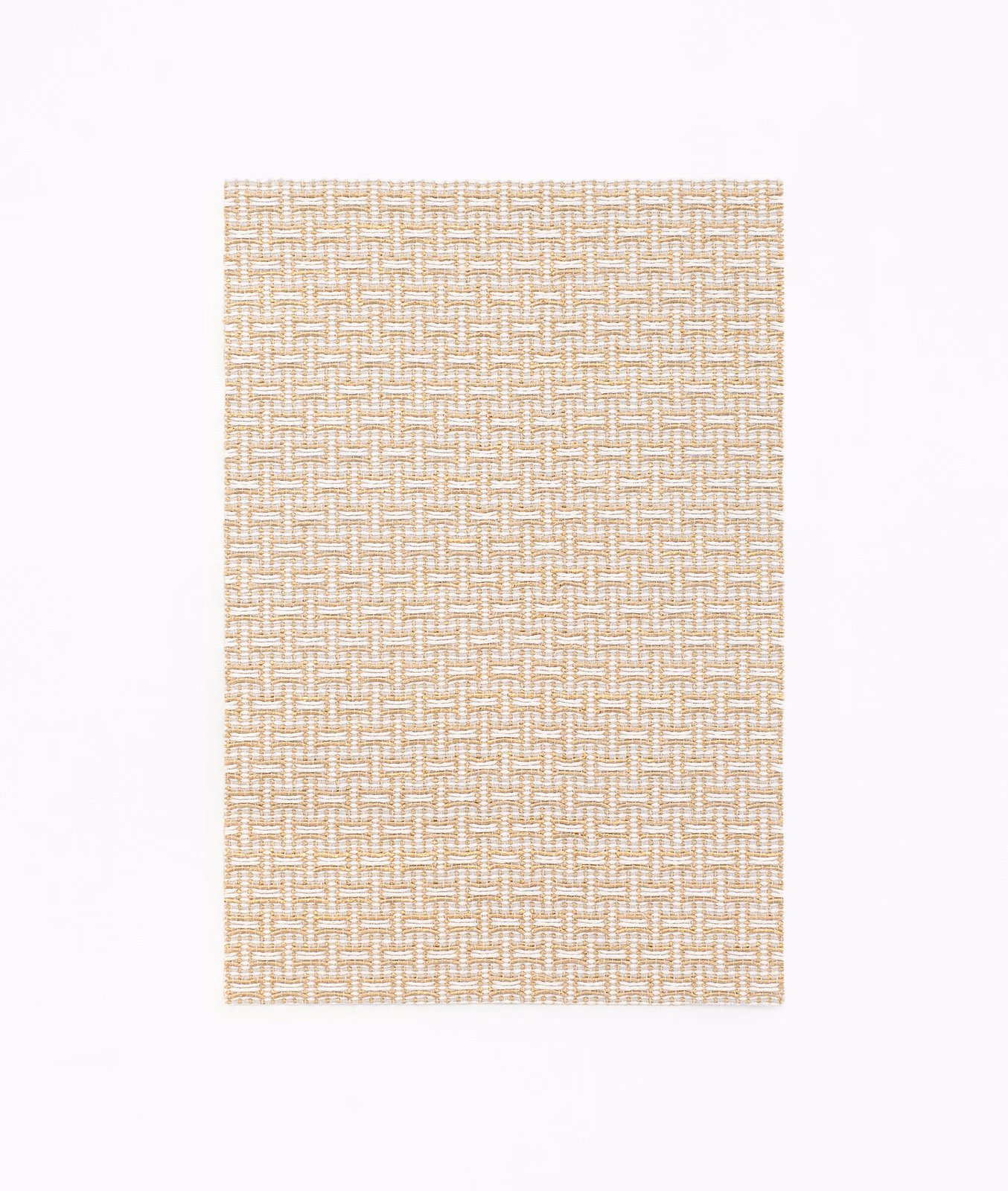 Warm champagne-beige jacquard with a fine interlocking geometric woven texture