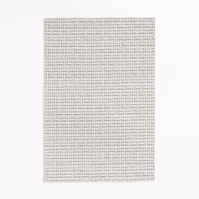 Pale greige jacquard swatch with a small interlocking geometric weave