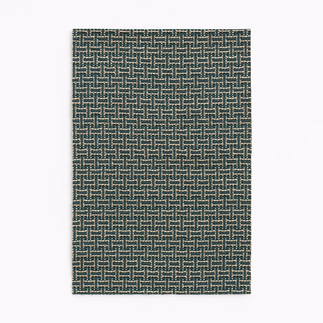 Deep petrol-teal jacquard swatch with a small pale geometric woven repeat