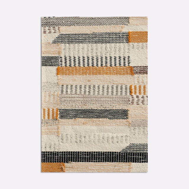 Natural cream jacquard with charcoal bars, ochre accents and raised woven bands