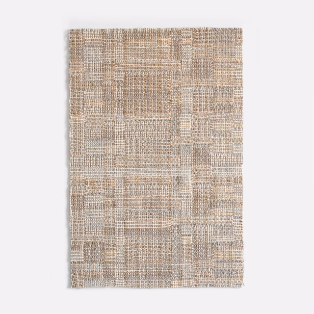 Warm greige jacquard with an irregular checked weave and softly flecked texture