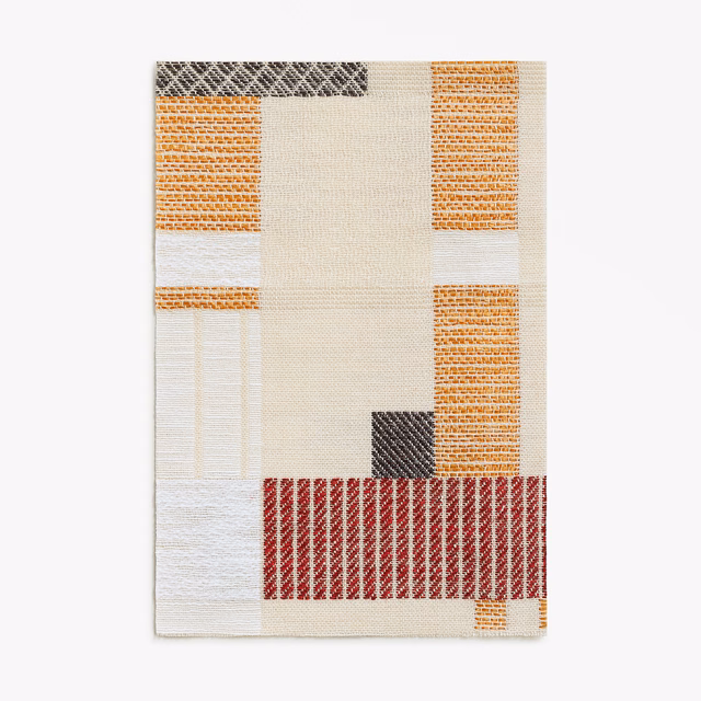 Warm cream jacquard with copper blocks, red stripe and charcoal herringbone accents