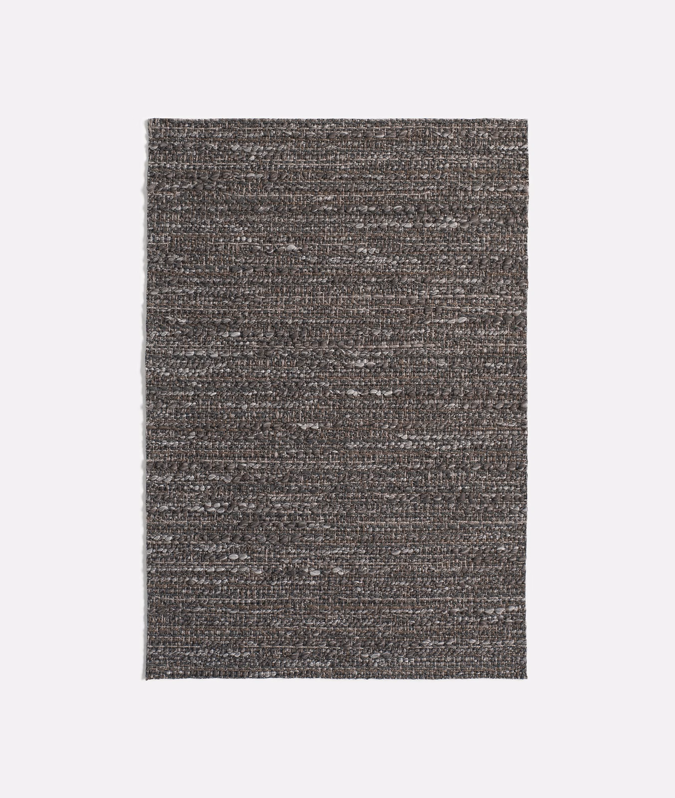 Charcoal grey Vézac Carbone jacquard with dense horizontal flecks and tactile woven texture
