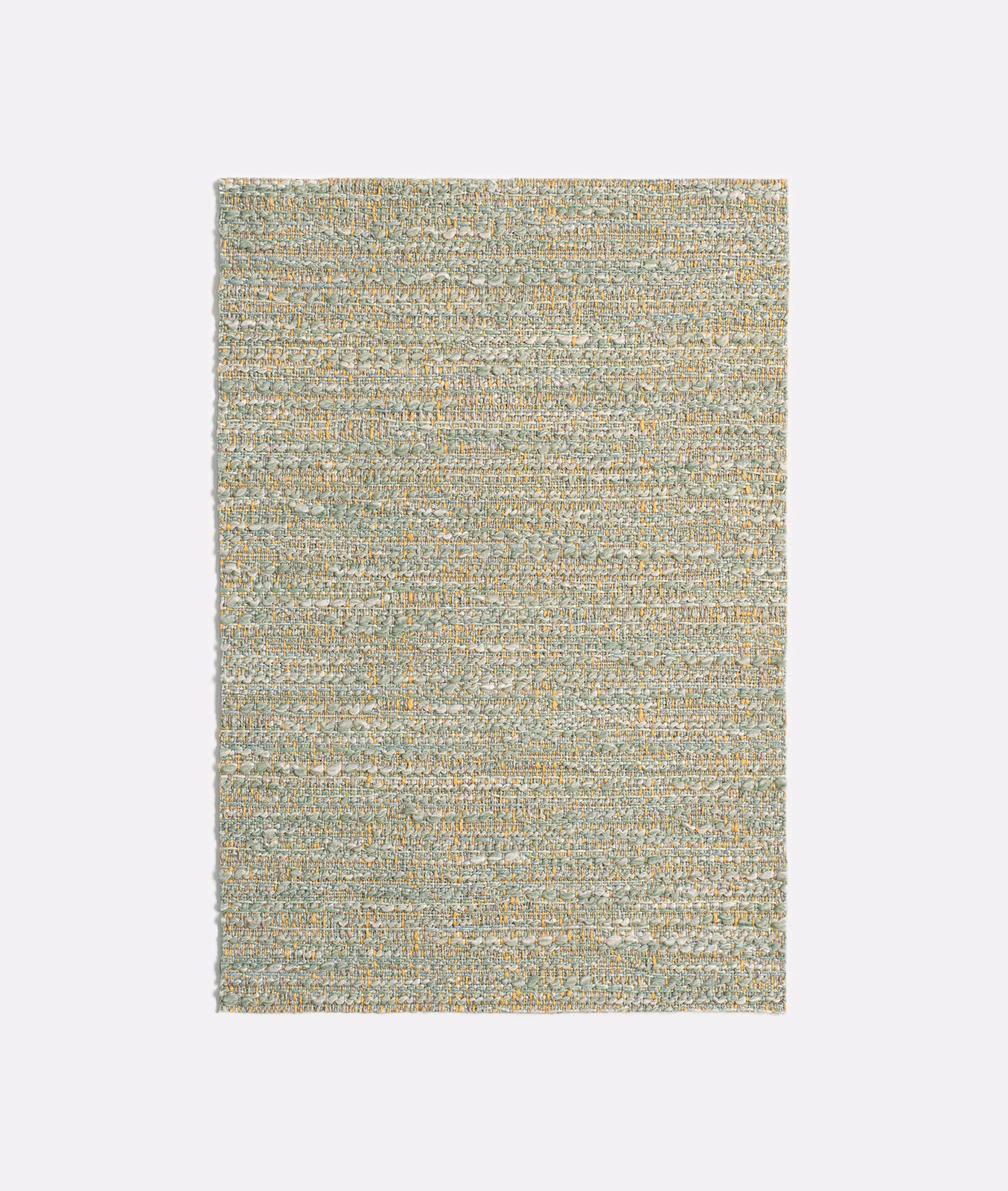 Close-up of muted sage and aqua jacquard weave with warm ivory horizontal texture