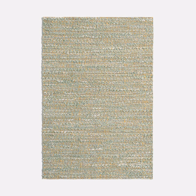 Close-up of muted sage and aqua jacquard weave with warm ivory horizontal texture