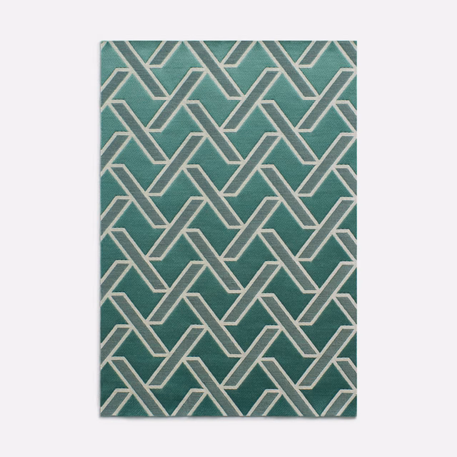 Aqua-teal jacquard with pale cream interlocking geometric bands and subtle woven texture