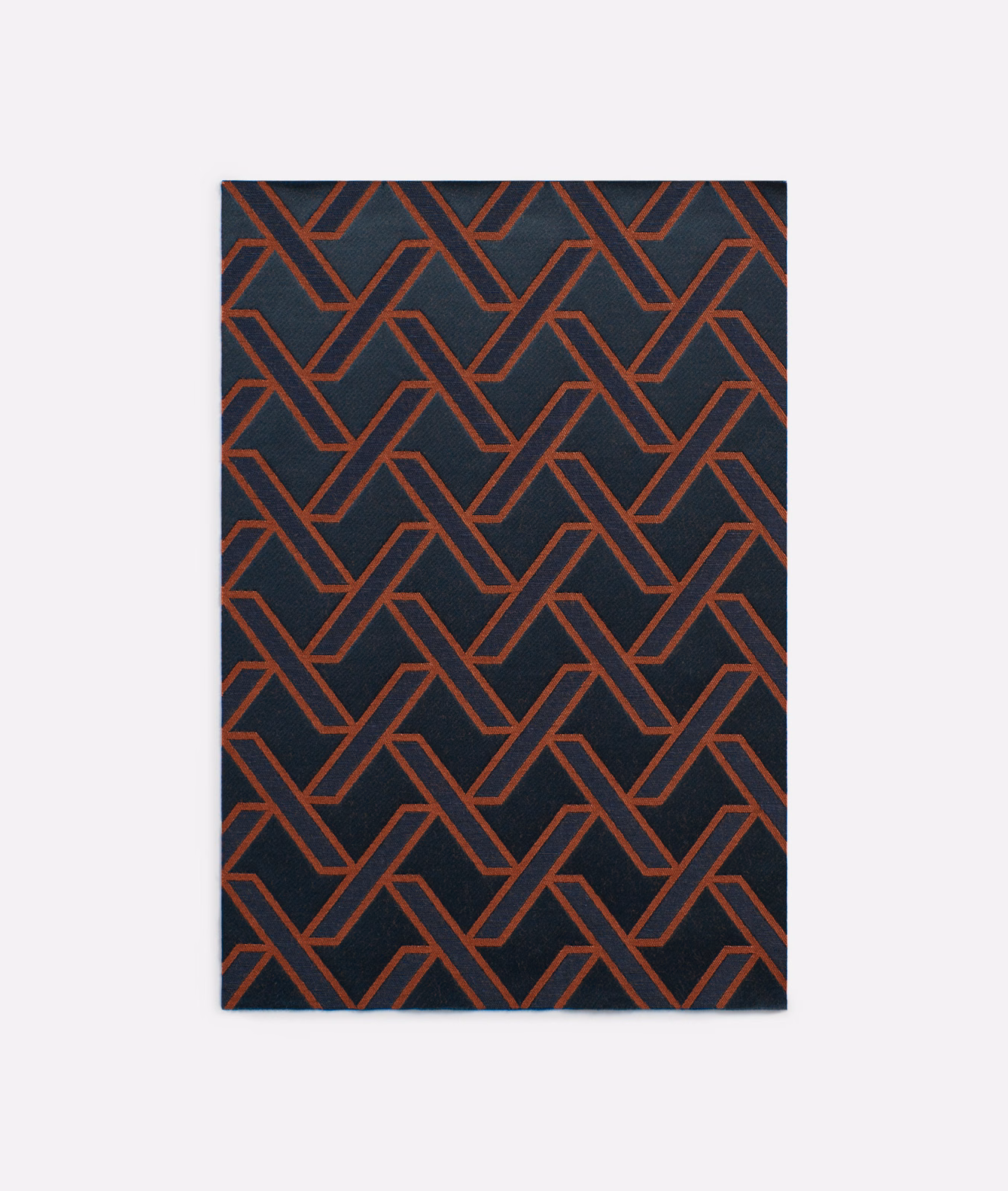 Near-black jacquard with repeating brick-red interlocking geometric lines
