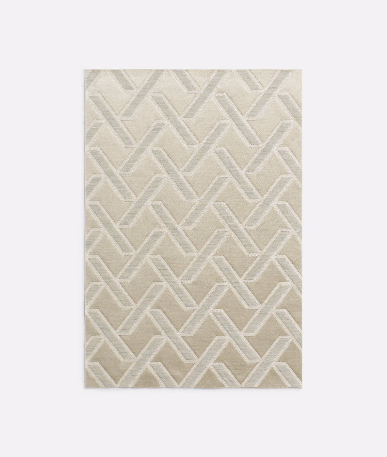 Warm écru jacquard with raised ivory interlocking chevrons and subtle woven texture