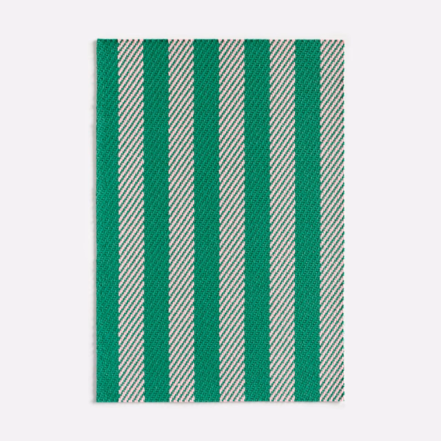 Emerald green and cream vertical jacquard stripes with a finely textured woven surface