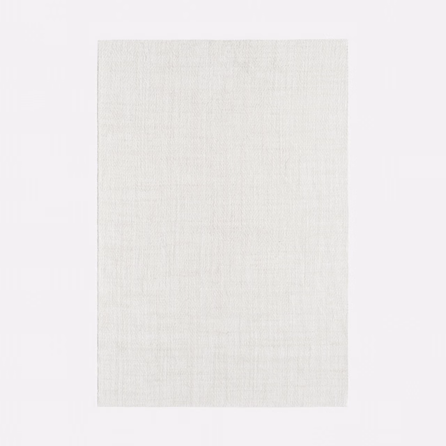 Pale silver-grey textile swatch showing a fine, subtle linen-like woven texture