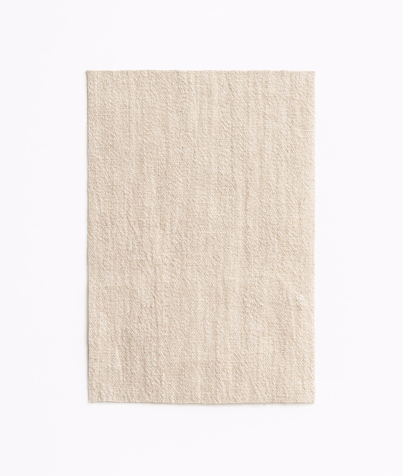 Pale ivory jacquard swatch with fine slubs and subtle vertical striations