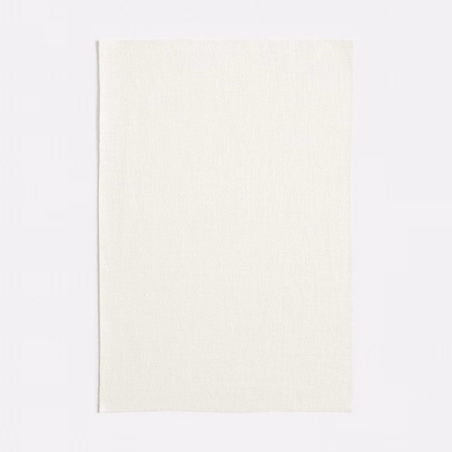 Warm ivory woven swatch with a fine, barely visible vertical grain