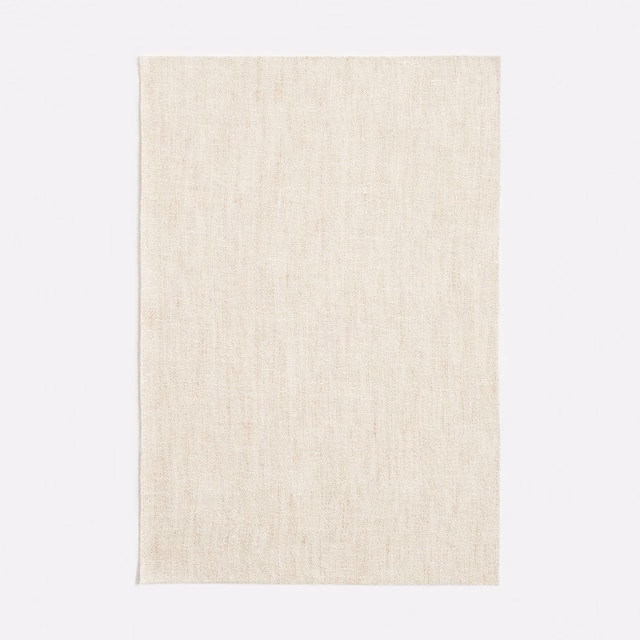 Warm ivory swatch with fine vertical linen-like slubs and a softly uneven weave