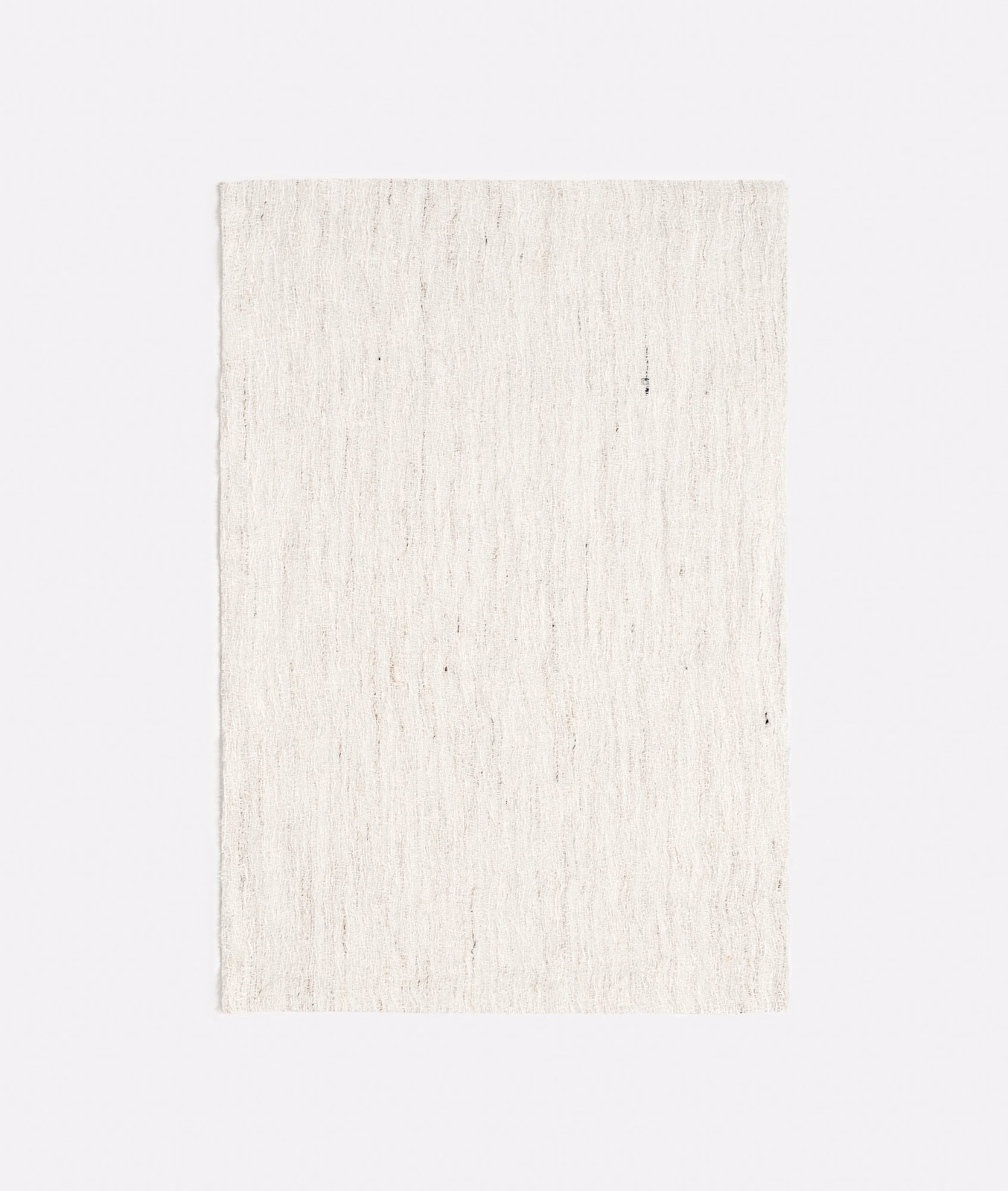 Pale Madreperla linen with delicate vertical strié slubs and softly ivory shading