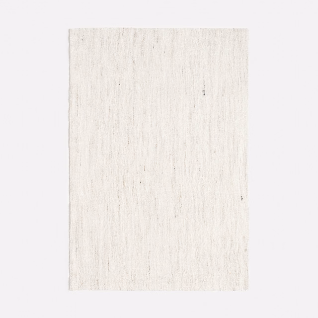 Pale Madreperla linen with delicate vertical strié slubs and softly ivory shading