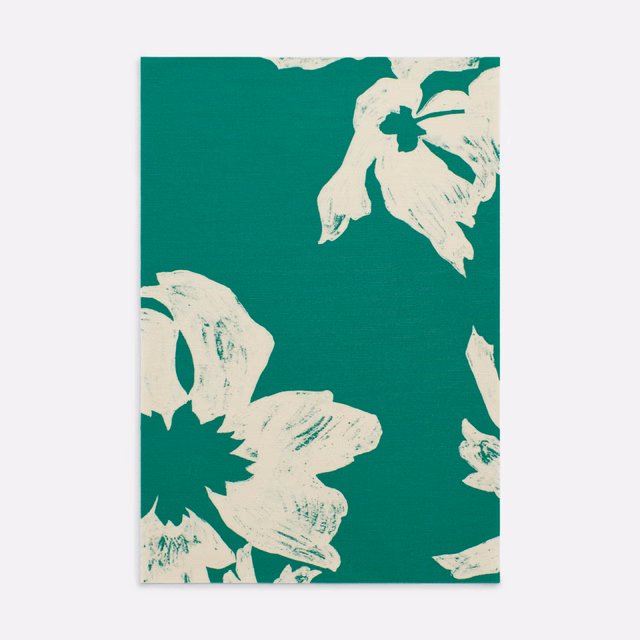 Vivid teal fabric with oversized off-white, brush-textured botanical flowers