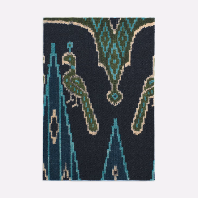 Deep indigo textile with turquoise Persian motifs and olive, ivory accents
