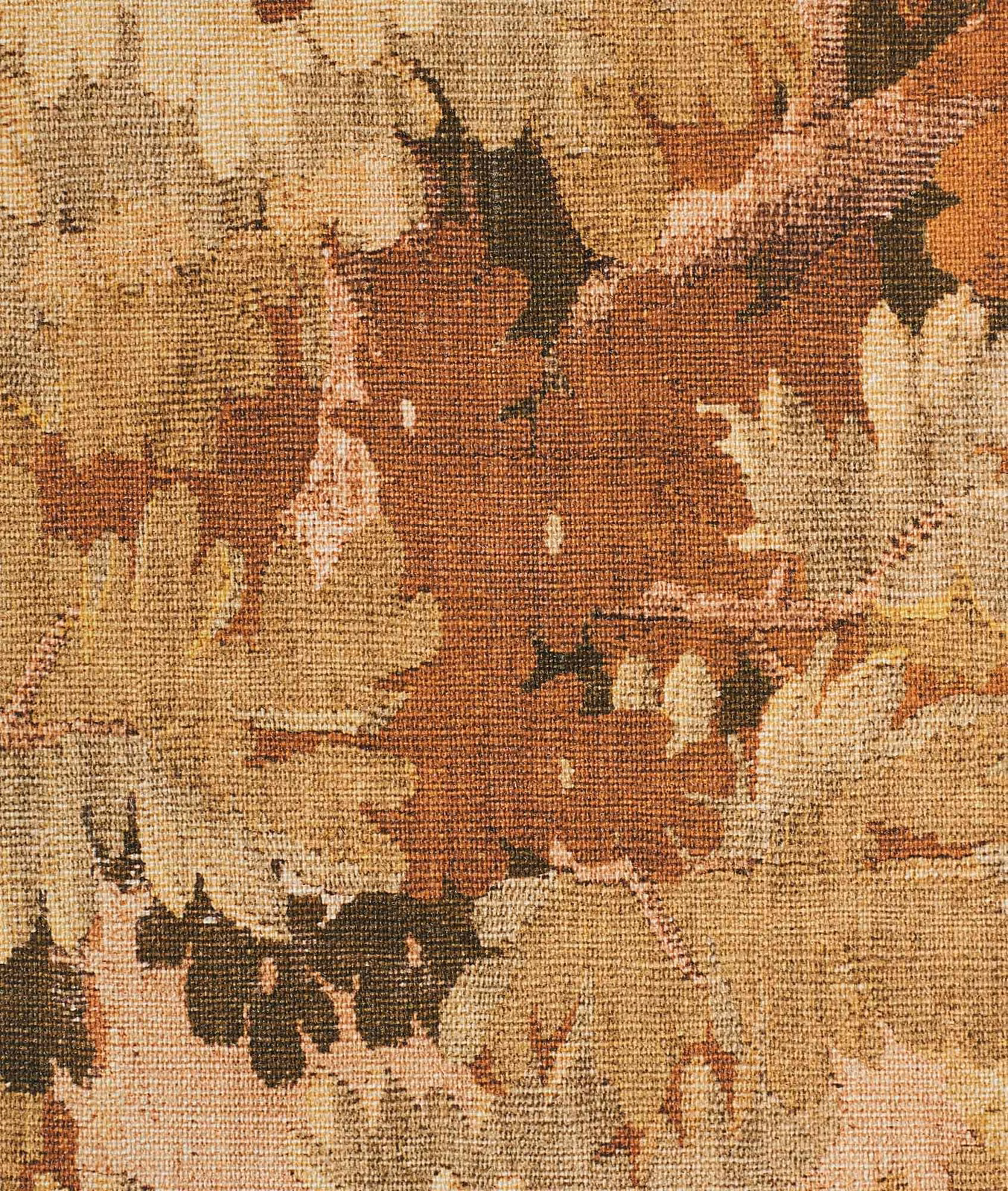 Coarse woven fabric with rust, ochre, cream and olive abstract botanical shapes