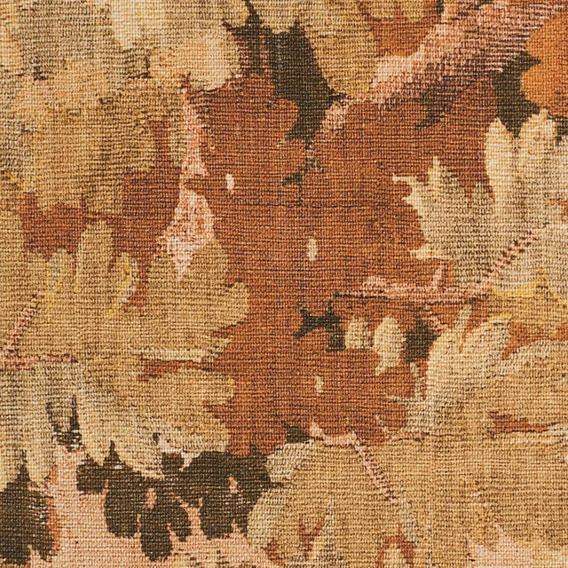 Coarse woven fabric with rust, ochre, cream and olive abstract botanical shapes