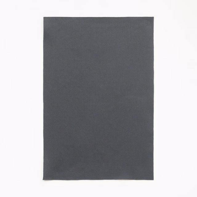 Dark charcoal grey satin swatch with fine texture and understated surface sheen