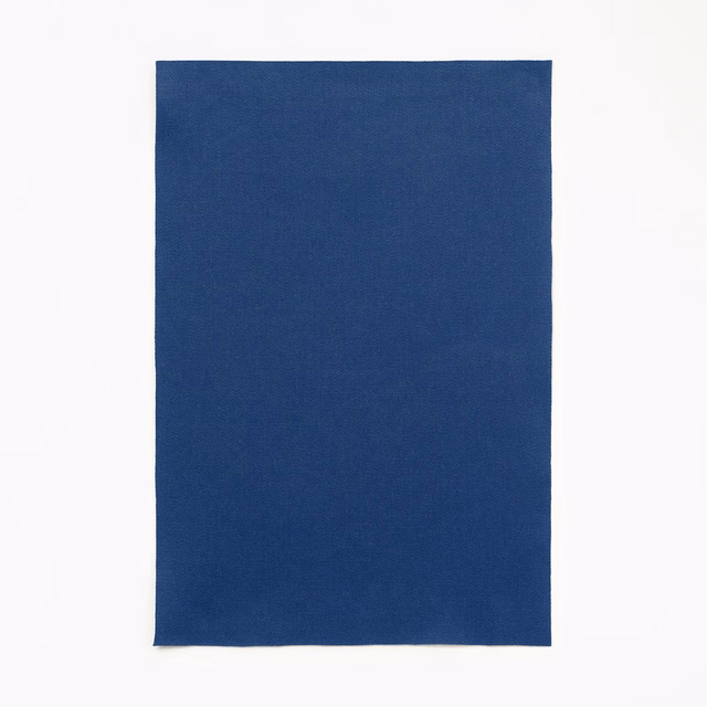 Deep Klein blue satin fabric with a smooth, subtly lustrous plain surface